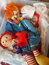 Tote of clown dolls