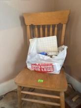 Wooden chair and bag with miscellaneous stickers