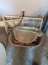 Antique bassinet with vintage dolls