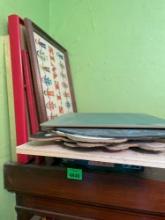 Picture framed wall decor, chalk boards, puzzles, and coloring pattern books