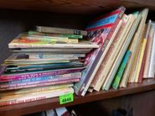 Books, third row down, right side. See photos for titles and authors