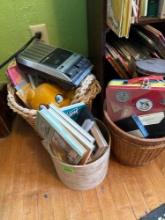 3 baskets of toys, cassettes, cassette player tins and more