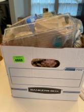 Box full of bathroom items, glass trinket trays, perfume bottles, hair straightener, curling iron, 2
