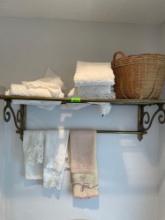 Towel rack, towels, and woven basket. Please bring tools to take rack down