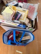 Box and tote bag of office supplies, calculators with tape, organizing bin, post it notes, rulers,