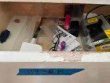 Contents in top drawer of dresser, belts, gloves, misc cords and other items