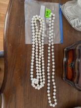 2 large white bead continuous necklaces