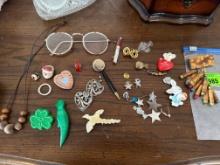 Eyeglasses, earrings, pins and more
