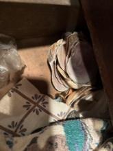 Contents in drawer, misc items shells and hand towel