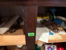 Contents on shelf, misc items, extension cords, disposable cups and napkins and more