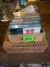 Box of cassette tapes and more