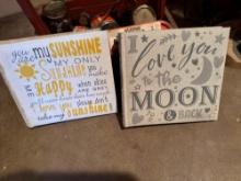 wooden Santa basket with sterno cooking fuel packs, hanging signs, and a few glass jars