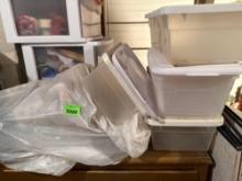 Storage totes and stuffed animals