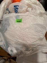 Bag of clothes and cow print sheets, size unknown