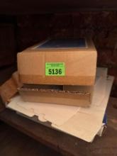 Brass and glass shadow box, mailing envelopes, sheet protectors