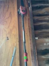 Troy built jump start with extension chain trimmer, blower attachment, weed eater attachment