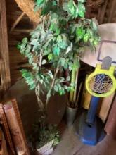 Artificial tree and round sheet of glass