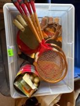 Badminton rackets, ping pong paddles, jokarj paddles, horse shoes, ping pong balls in tote