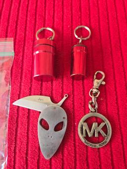 4 Assorted Key Chains. All one Money