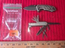 2 Knives. 1 Lock Blade with Belt Clip and 1 Camping/Survival Knife. Both one Money.