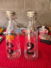 Pair of Vintage Milk Bottles with Sealable Lids. Listed from Previous Auction Due to Non Payment and
