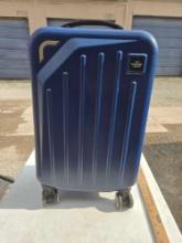 The Sharper Image Hard Case Suitcase. On Rollers with Extendable Handle.