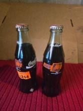 Pair of Phoenix Suns 25 Year Commerative Coca-Cola Bottles. Collectible. Both One Money.