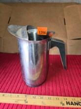 Ornate Stainless Steel Warer Pitcher.