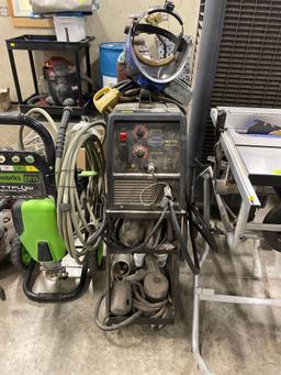 Eastwood MIG 175 welder w/ helmet and compressed gas can