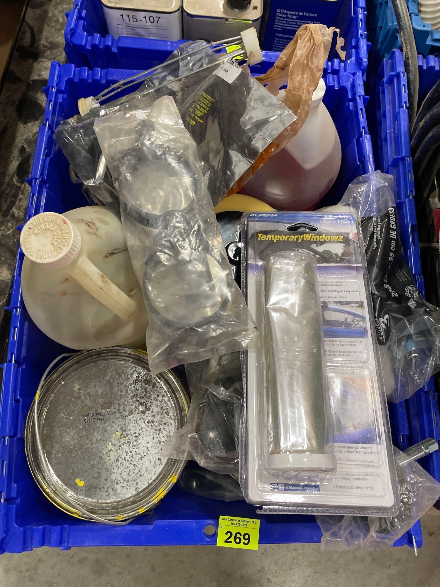 tub of adhesive remover; degreaser; paint rollers