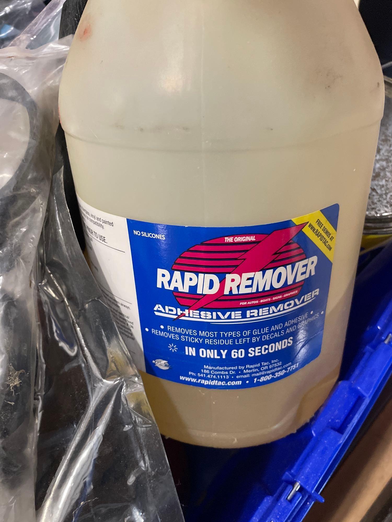 tub of adhesive remover; degreaser; paint rollers
