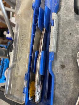 moisture meter; vise grip; saw blades