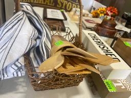 basket; towel; wooden utensils