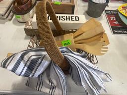 basket; towel; wooden utensils
