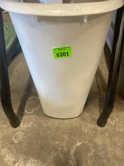 small white trash can