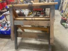 2 wooden saw horses