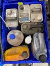 tub of coolant; paint thinner; engine oil; misc