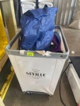 kids costumes in laundry basket