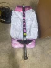 boogie board; pool float; pogo stick