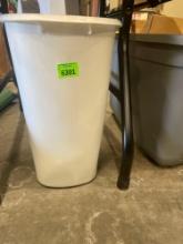 small white trash can