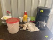 Bunn coffee maker; sugar; creamer; stir stix