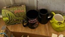 Dr Seuss lunch box, Shrek coffee mug and 2 other collector mugs