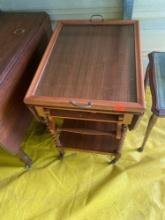 Antique mahogany drop leaf tea cart with tray One wheel the tire is coming off