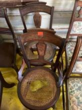 2 antique wooden chairs with wicker seats, damage to both seats