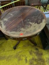 Wooden antiqueround end table on castors, damage to table top Measurements in photo
