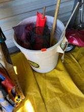 Bait saver bucket with fishnets, cordage, and other various items