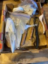 Box of kitchen items, spatulas, wood, cutting board, fire alarm and other items