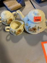 Vintage tea, pot with creamer and sugar bowls