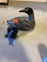 Two duck figurines