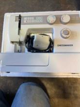 Dressmaker, sewing machine inbox